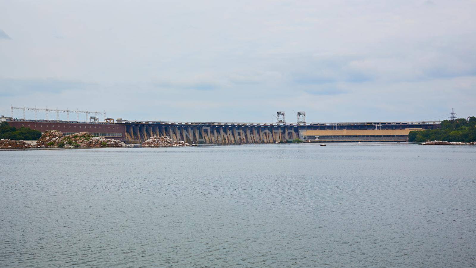 View of DneproGES in Zaporozhye. Hydroelectric power station on the Dnipro River in Ukraine. Power generation.