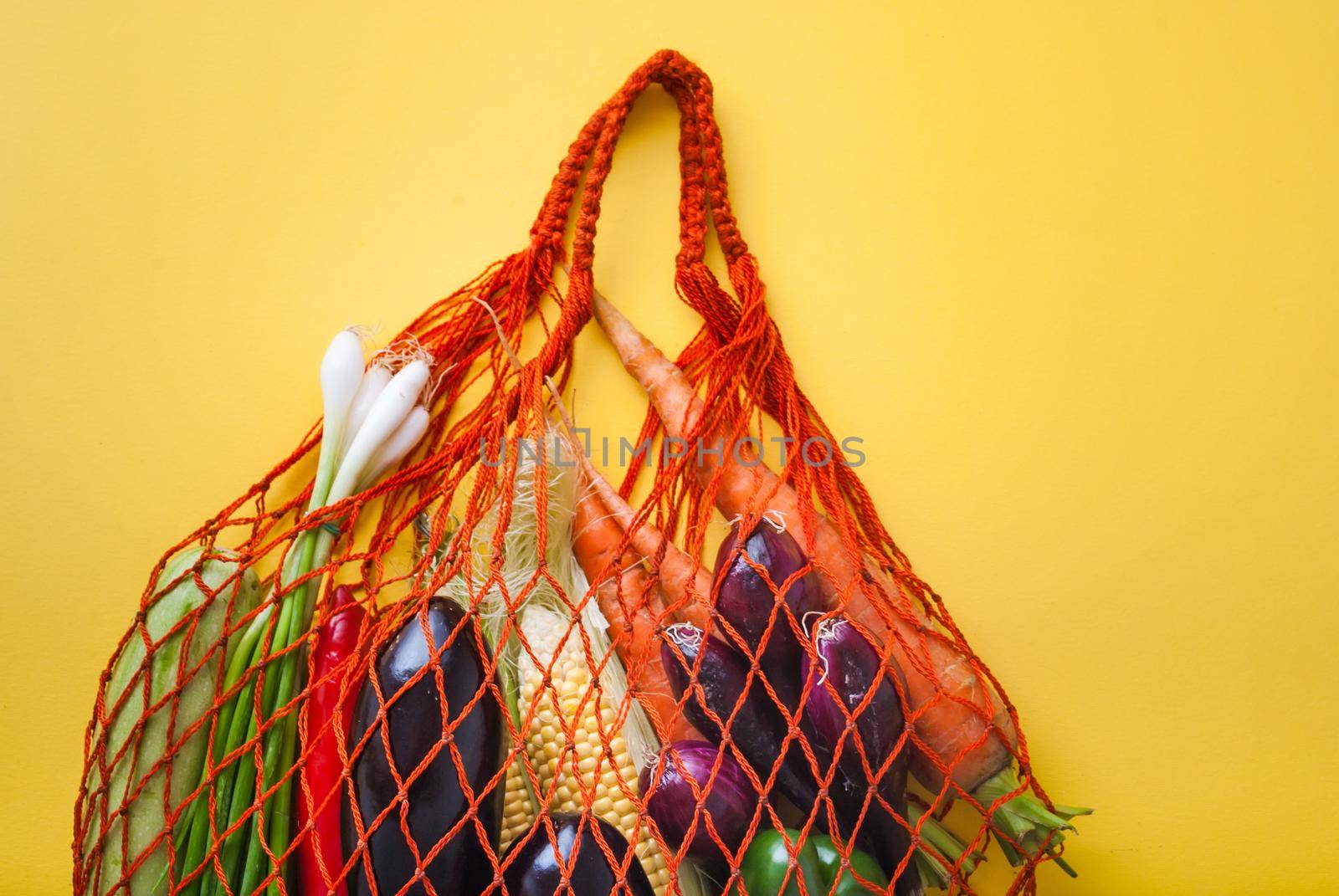 zero waste shopping concept. vegetables in mesh bag without plastic by maramorosz