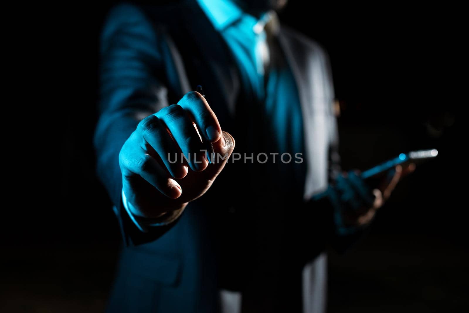 Businessman Pointing Important Infortmations With One Finger.