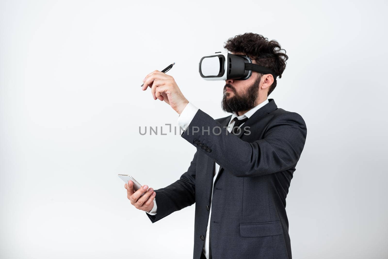 Man Holding Mobile Phone, Wearing Vr Glasses And Pointing On New Idea.