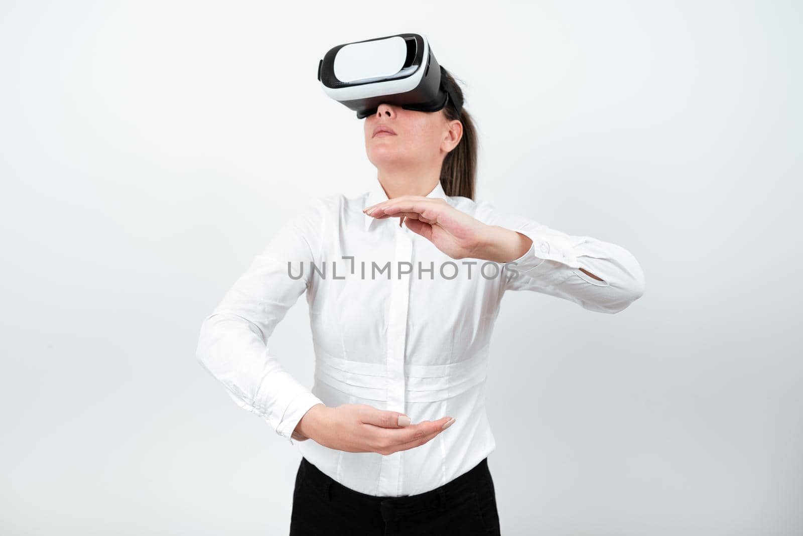 Woman Wearing Vr Glasses And Presenting Important Messages Between Hands.