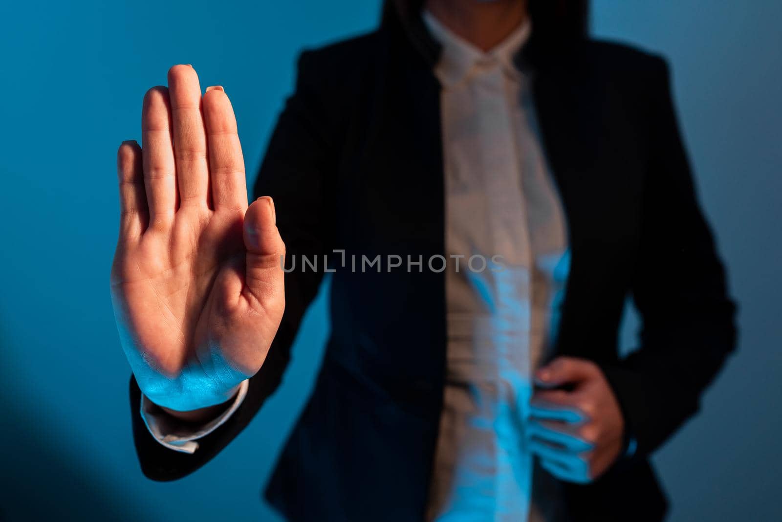 Businesswoman Pointing Important Infortmations With One Hand.