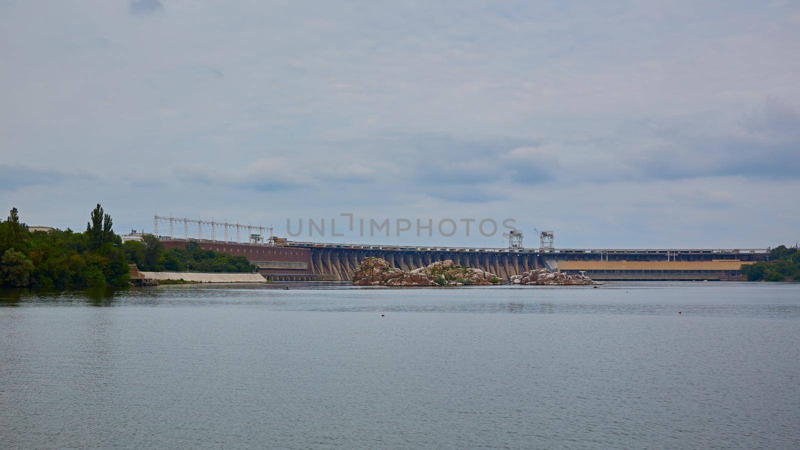 View of DneproGES in Zaporozhye. Hydroelectric power station on the Dnipro River in Ukraine. Power generation.