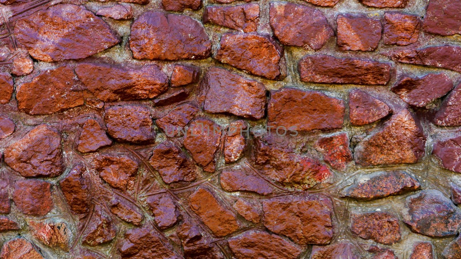 Abstract background made of stone painted with red paint. by gelog67