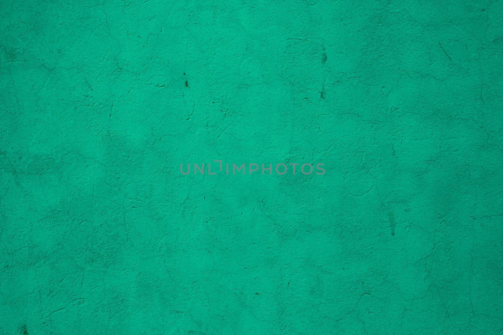 Abstract background of old blue green plaster.