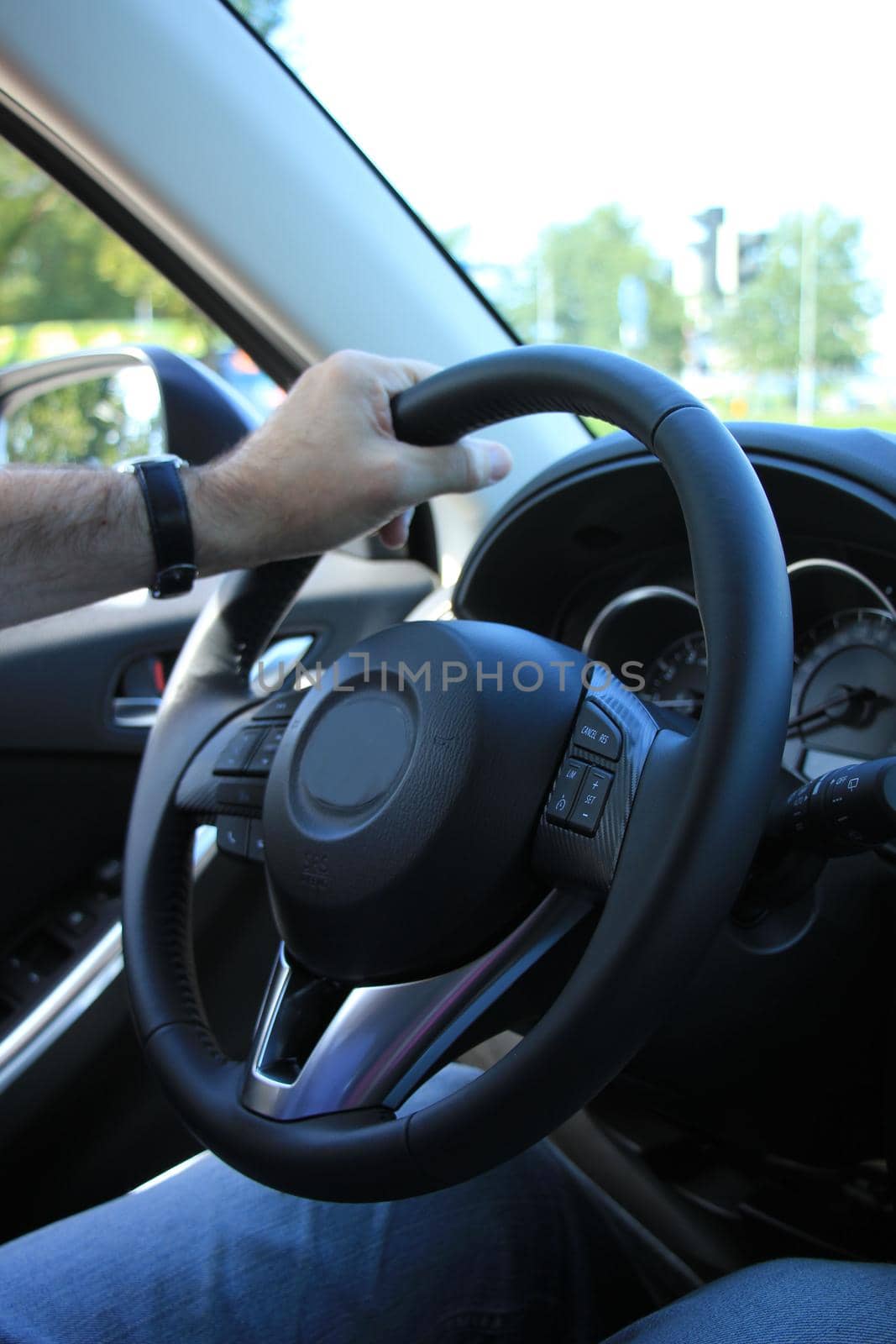 Modern car interior, luxurious materials in different shades of grey