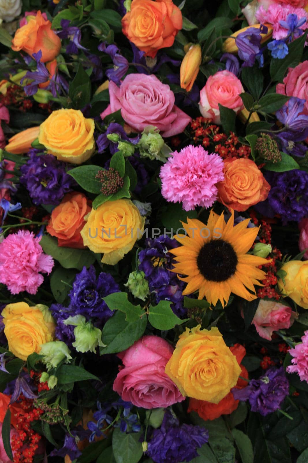 Mixed colorful flowers in a floral wedding decoration