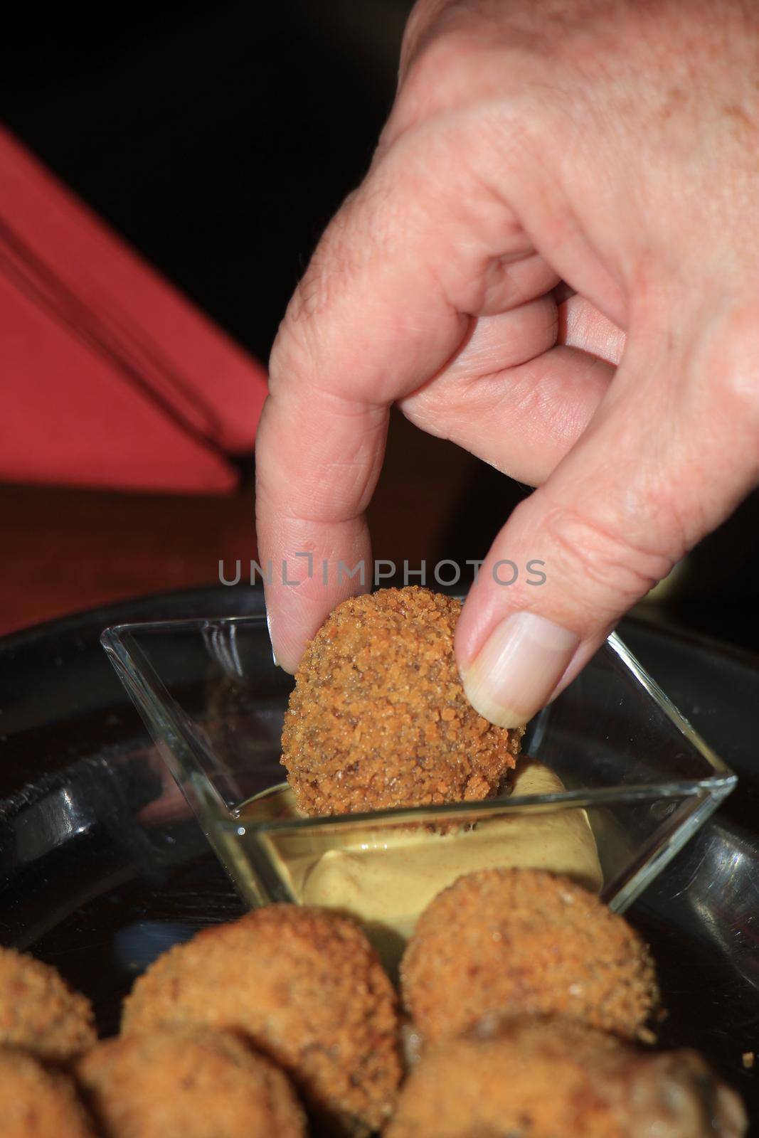 Bitterballen with mustard, warm fried snack, served in the Netherlands