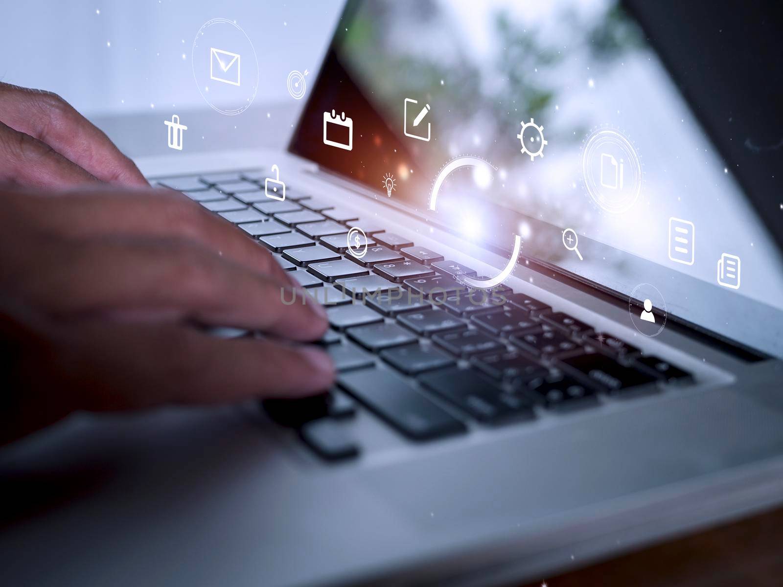 Hands man useing laptop computer with E-commerce technology icons on virtual screen. Business global, social media marketing concept. 