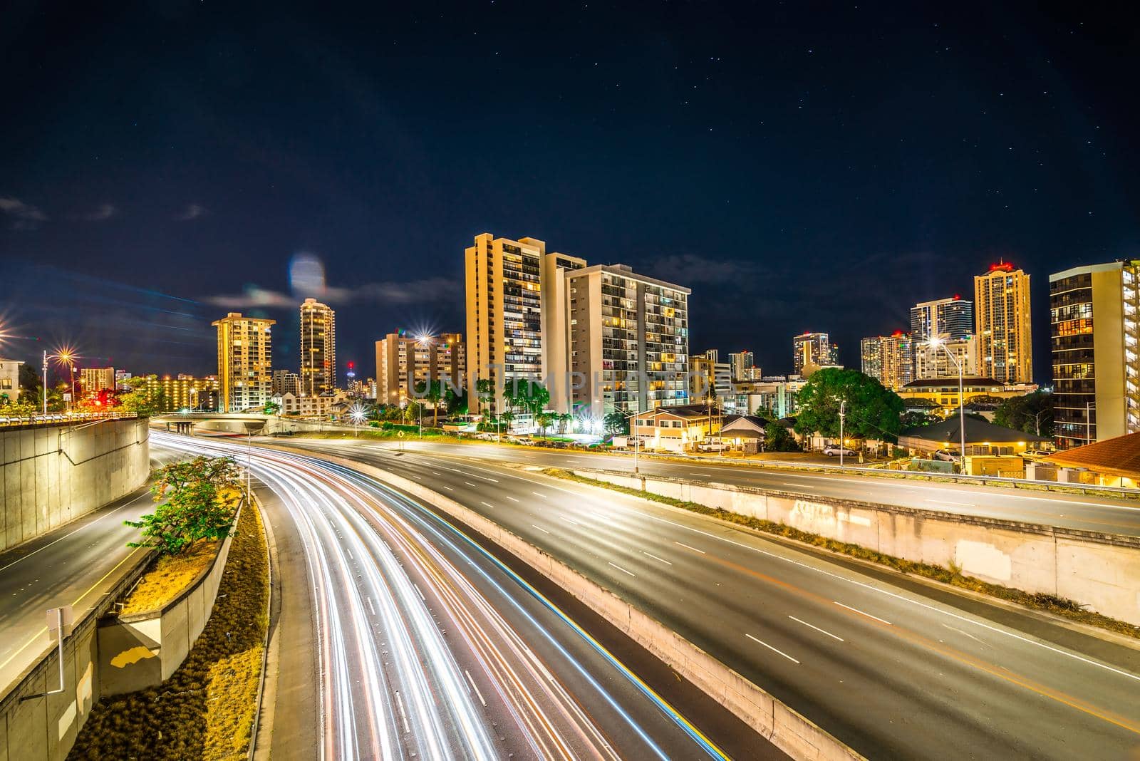 evening commute on H1 Freeway at night in honolulu hawaii by digidreamgrafix