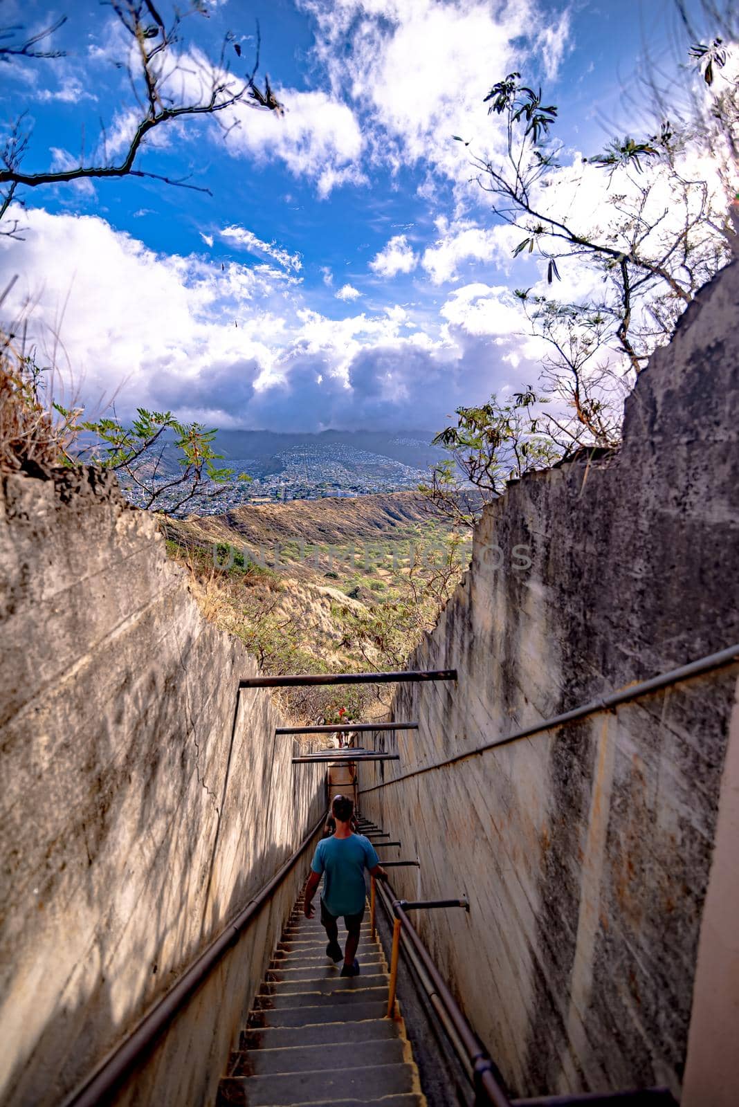 walking down a stair at diamond head state park in oahu hawaii by digidreamgrafix