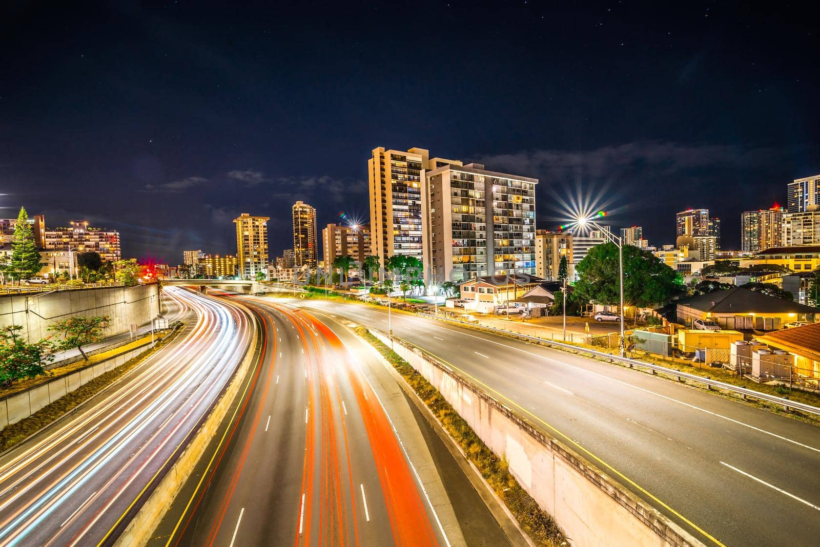evening commute on H1 Freeway at night in honolulu hawaii by digidreamgrafix