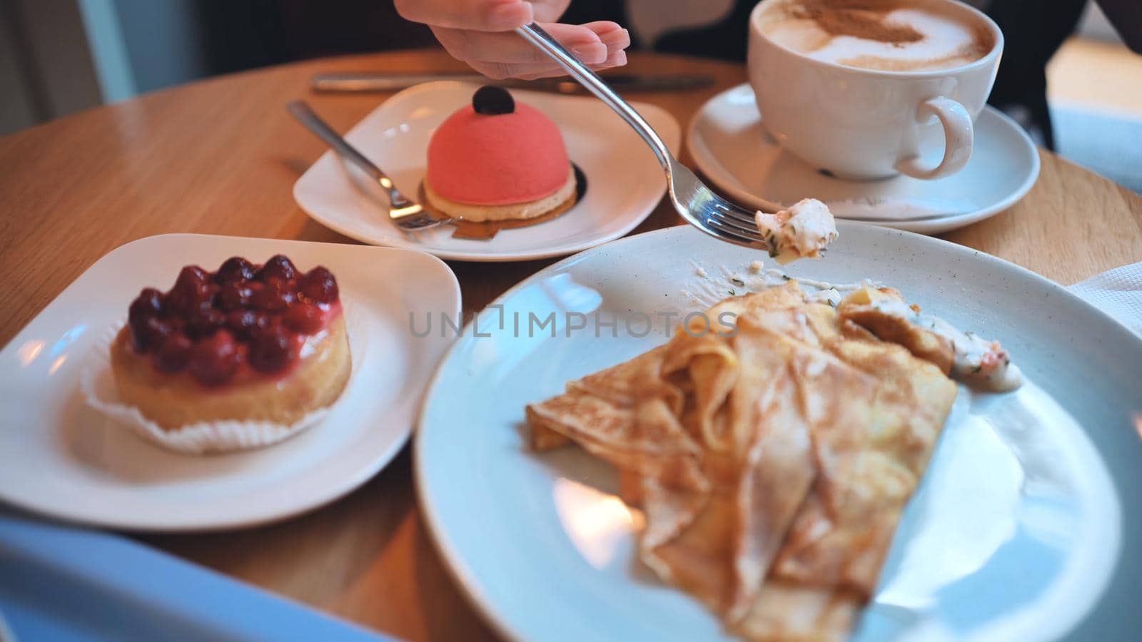 A table of cakes and coffee at a girl's breakfast
