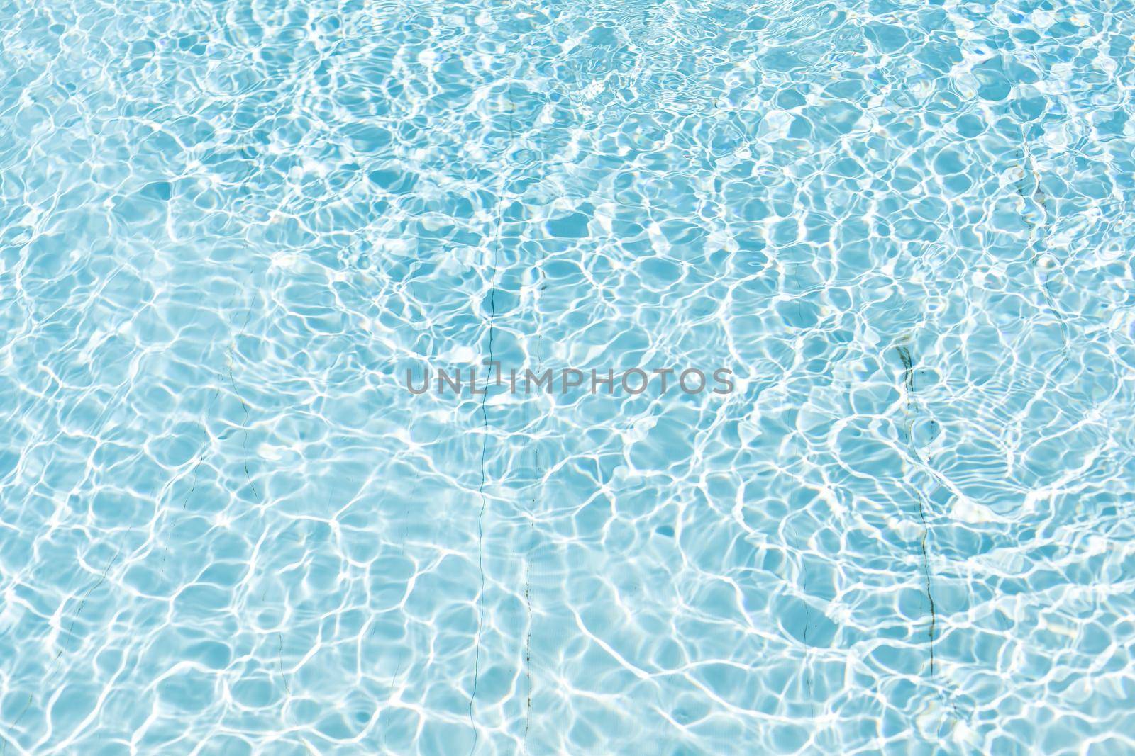 surface of blue swimming pool, background of water in swimming pool