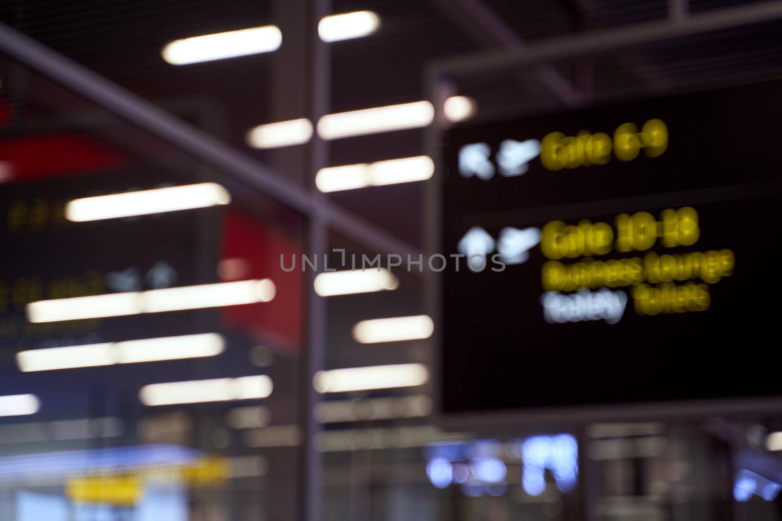 Blurred international airport interior background with bokeh and copy space