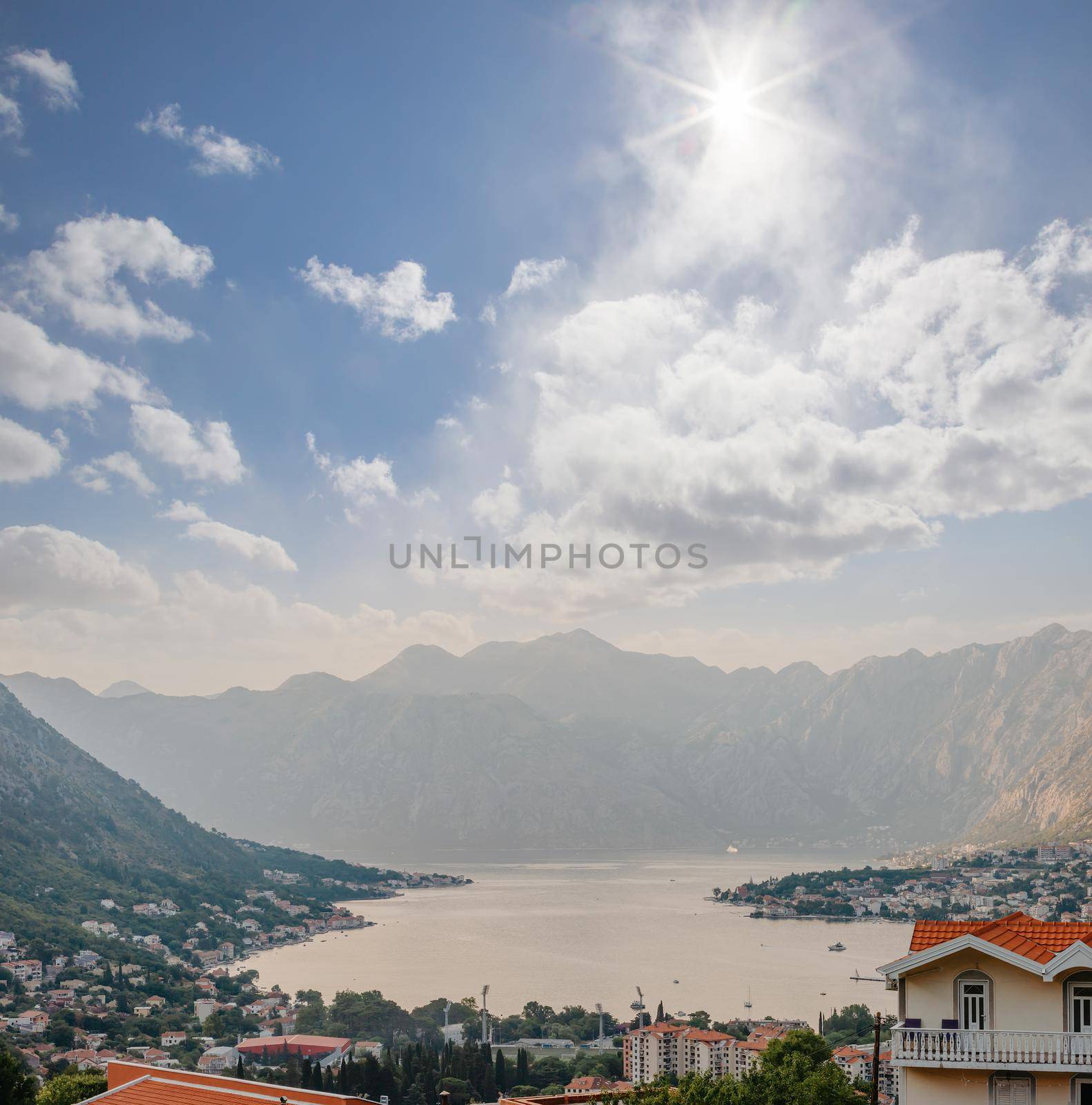 Sunset, beautiful landscape with silhouettes of trees. Travel concept. Montenegro, Kotor Bay. Sunset at Kotor Bay Montenegro. View of the sunset in Boko-Kotor Bay in Montenegro.