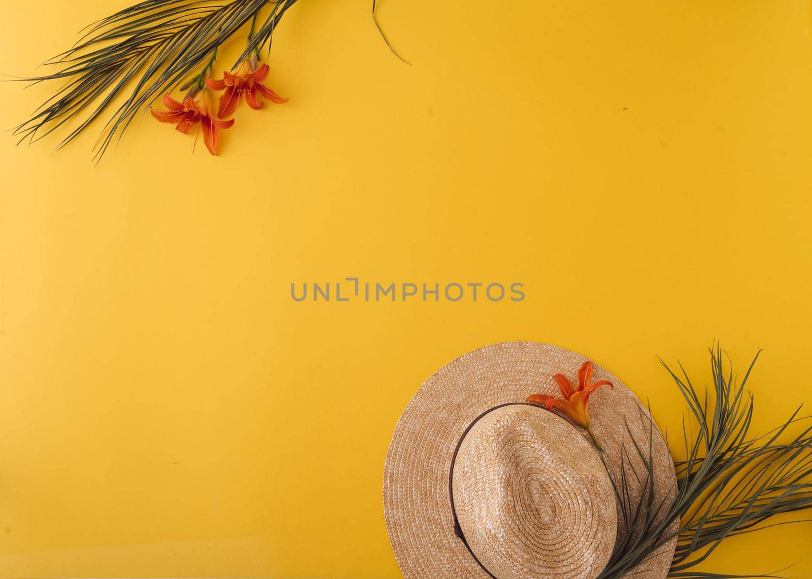 ummer background with straw hat and bag and palm leaves by maramorosz