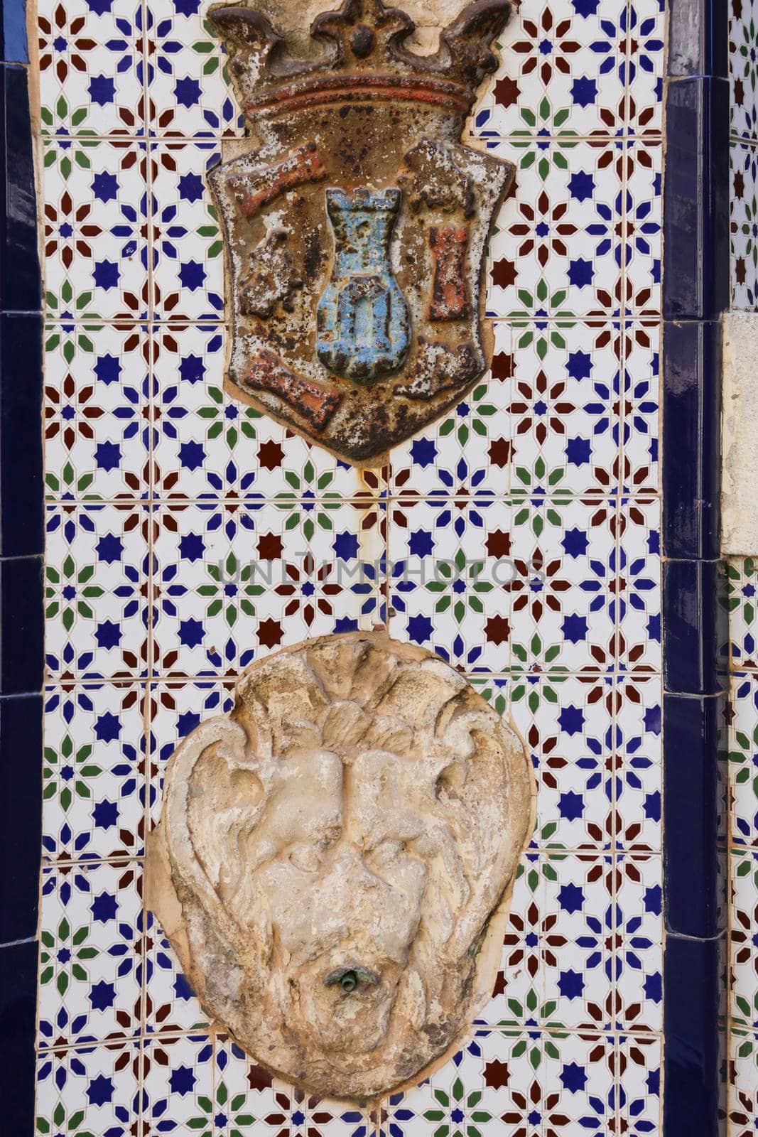 Cartagena, Murcia, Spain- July 18, 2022: Fountain made of tiles and stone in San Gines de la Jara Square in Cartagena village, Murcia