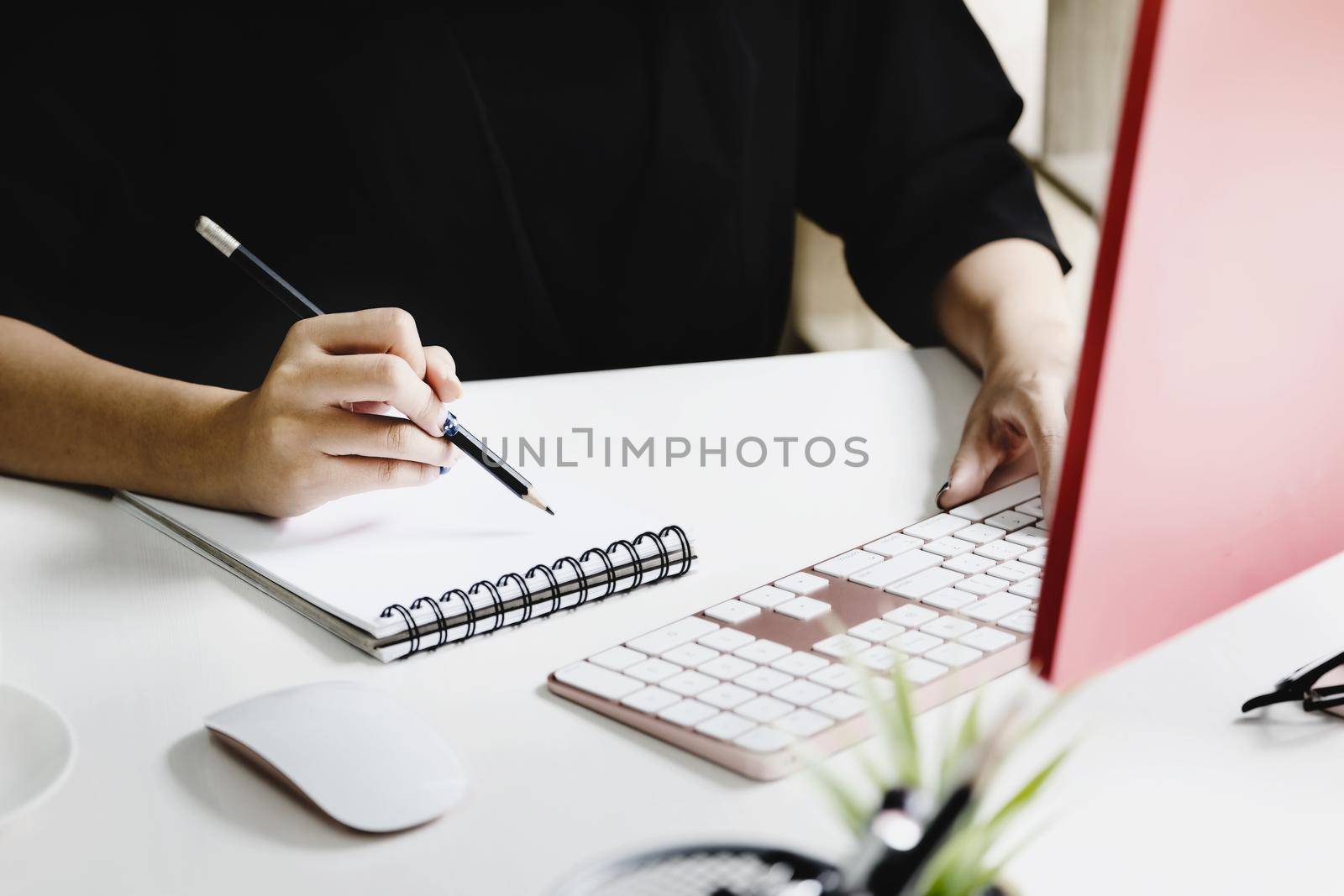 Work from home Company employees use their notebook and computers to work from home to prevent the corona virus from meeting outsiders. by Manastrong