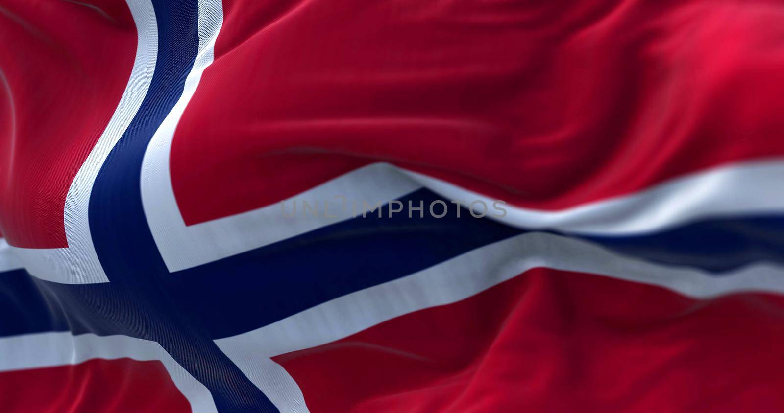 Close-up view of the Norway national flag waving in the wind. Norway is a Nordic country in Northern Europe