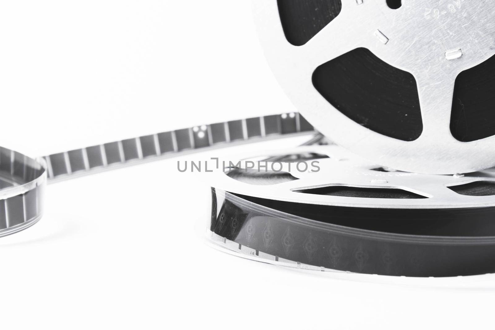 Vintage film strip isolated on white background. Film footage on film. Analog cinema. Old cinema.