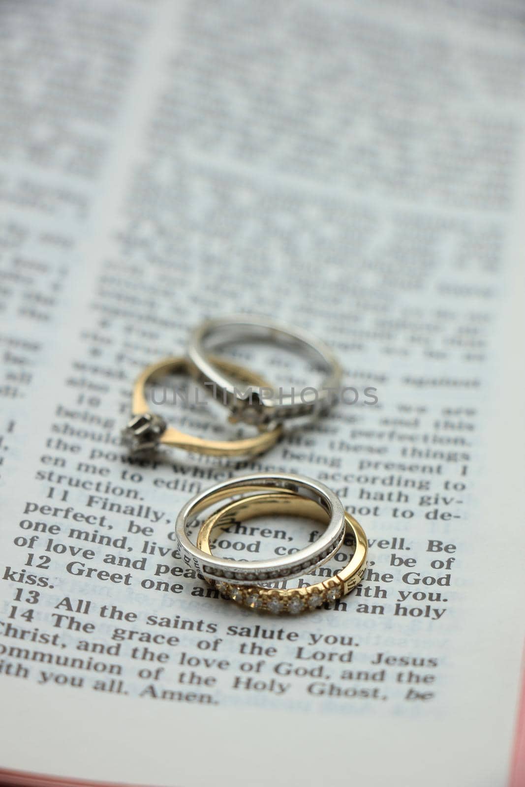 Two wedding sets, one in yellow gold, one in white gold for a double bride wedding on a bible verse