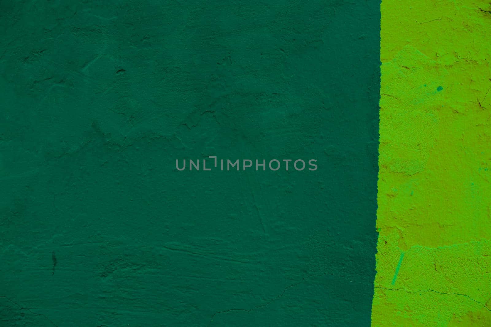 Abstract background from two green color shades on the wall. by gelog67