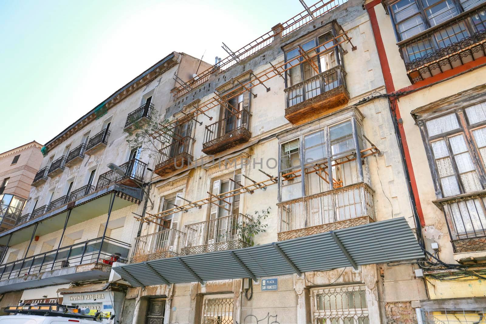 Cartagena, Murcia, Spain- July 18, 2022: Modernist Style Houses under restoration next to San Francisco Square in Cartagena city