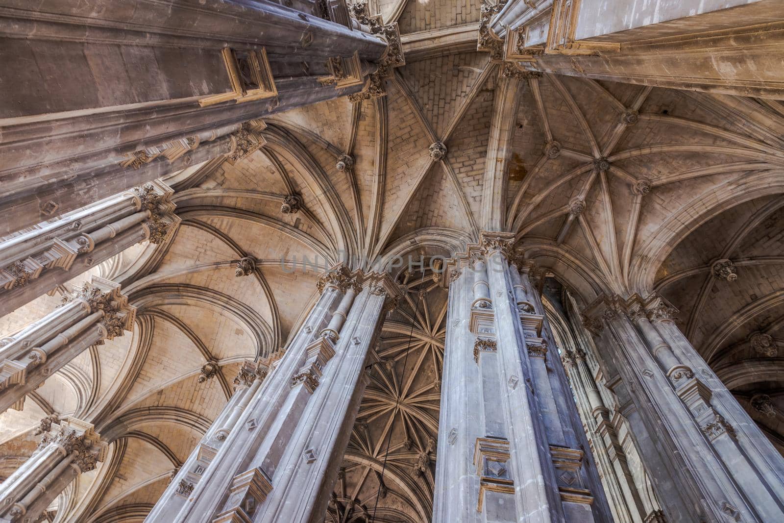 View of nave and archs inside gothic and classic Church of St. Eustache, Paris