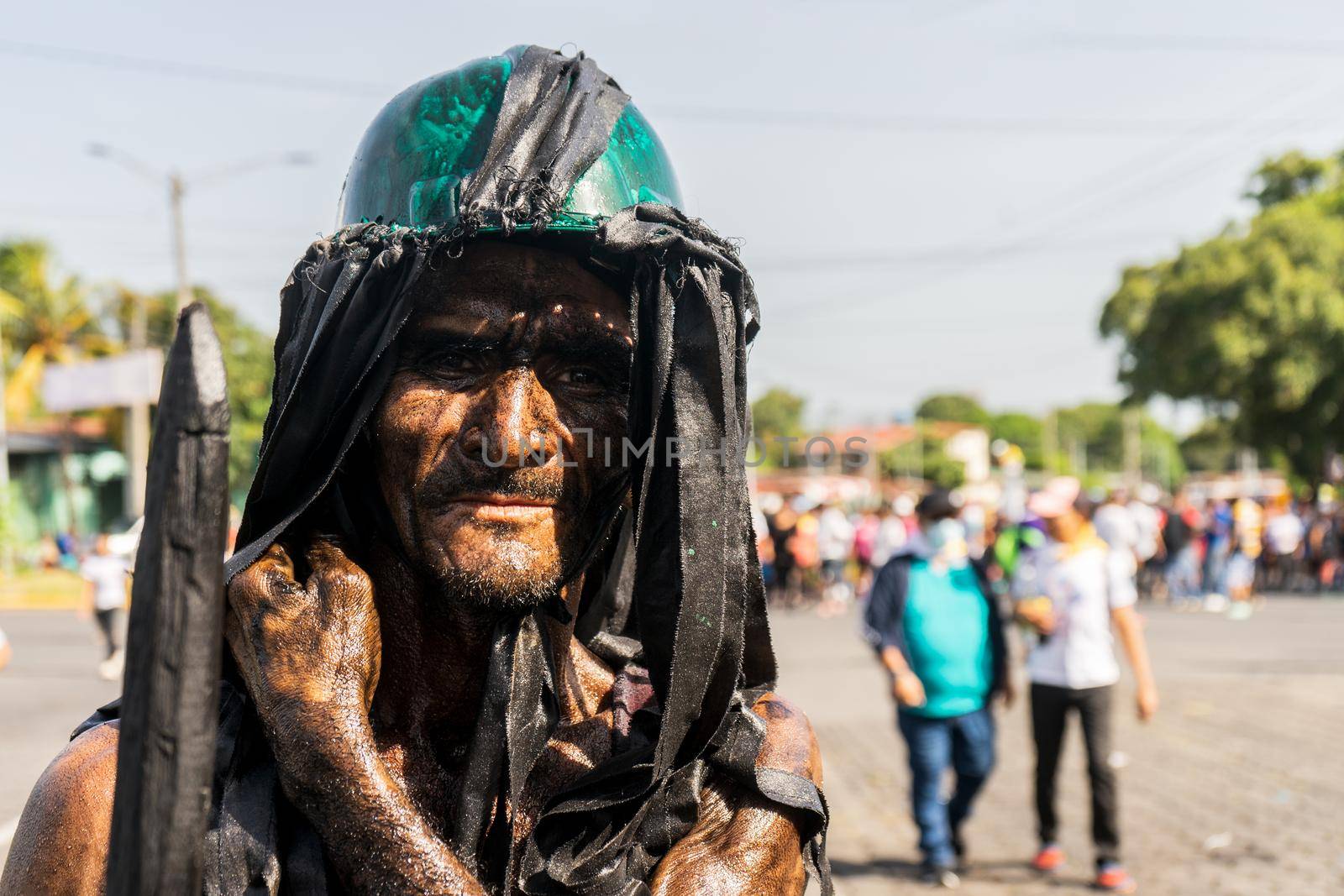 Portrait of a devotee of Santo Domingo paying a promise in a traditional festival in Managua, Nicaragua