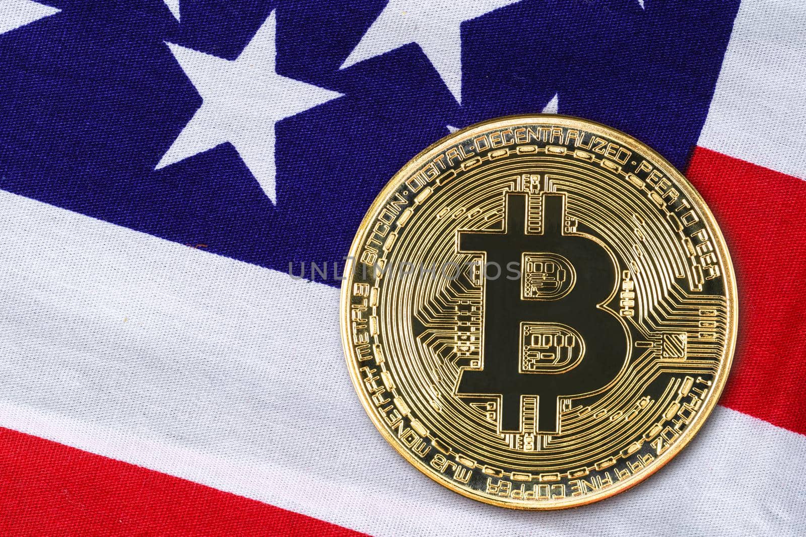 Close up gold bitcoin coin on usa flag  by stoonn