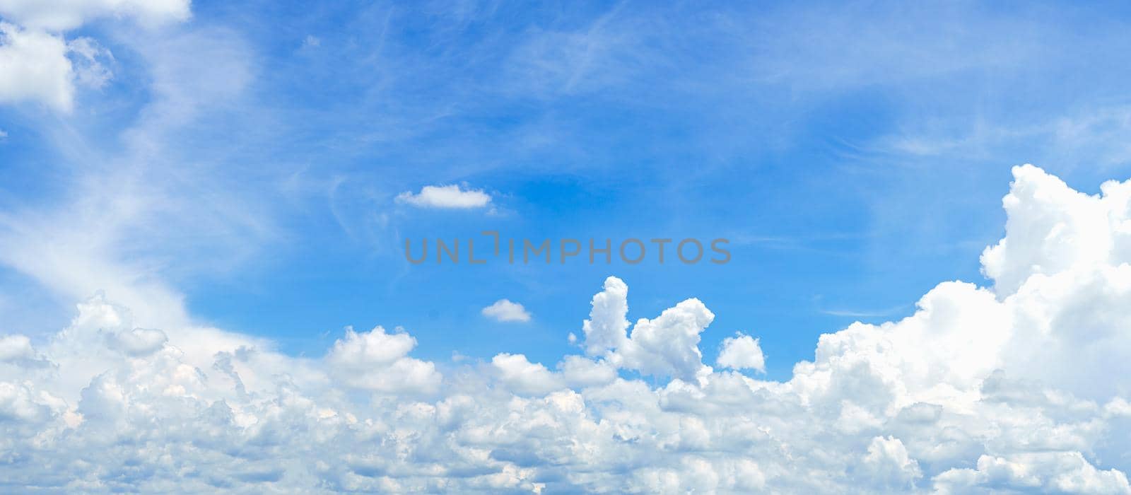 Panorama fluffy clouds in blue sky by stoonn