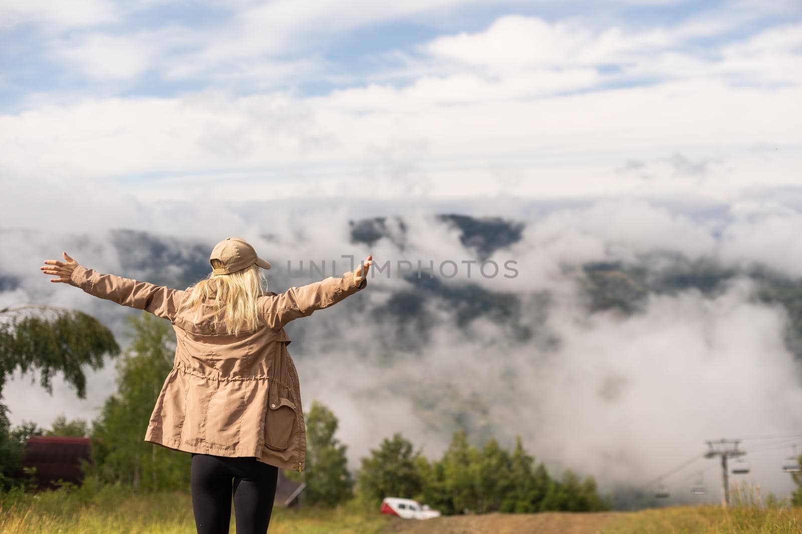 woman backpacker enjoy the view at mountain.