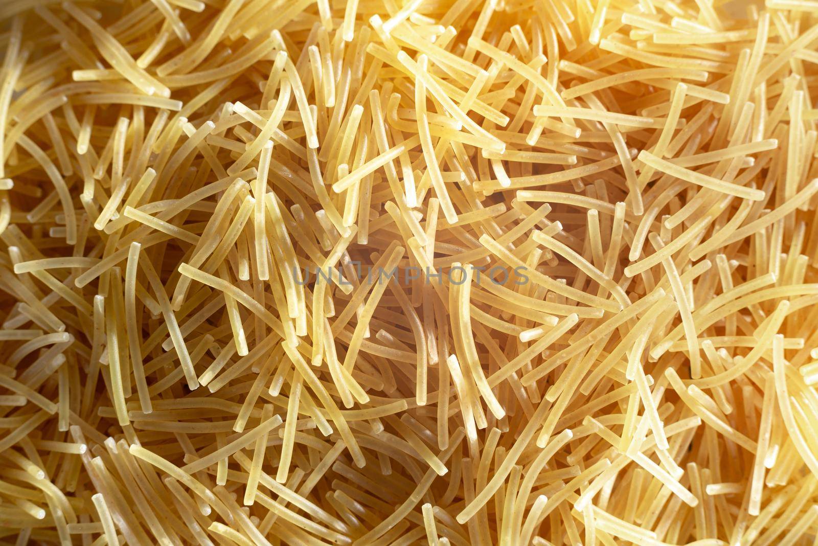 the pasta is thin. Dry thin pasta pasta very close. Macro.
