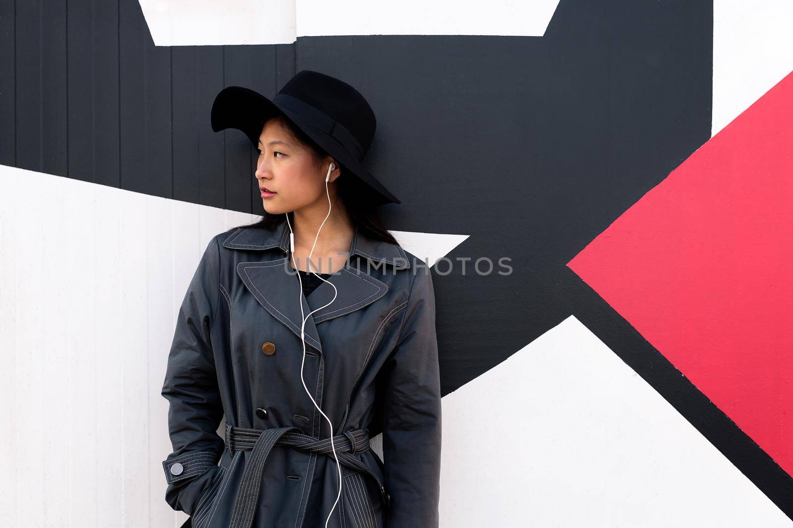 young beautiful classy chinese girl with earphones by raulmelldo