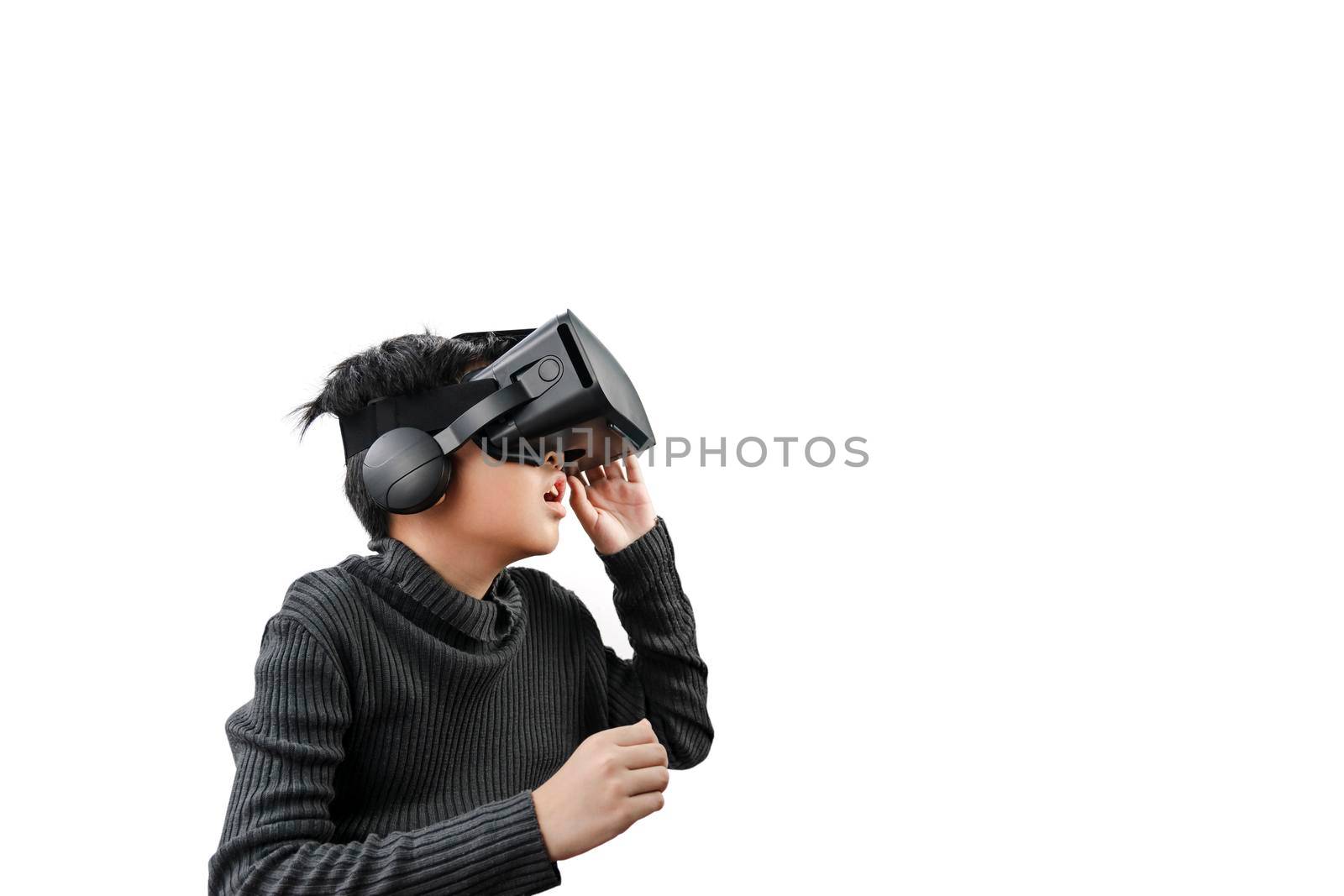 Asian boy wearing VR glasses headset by wattanaphob