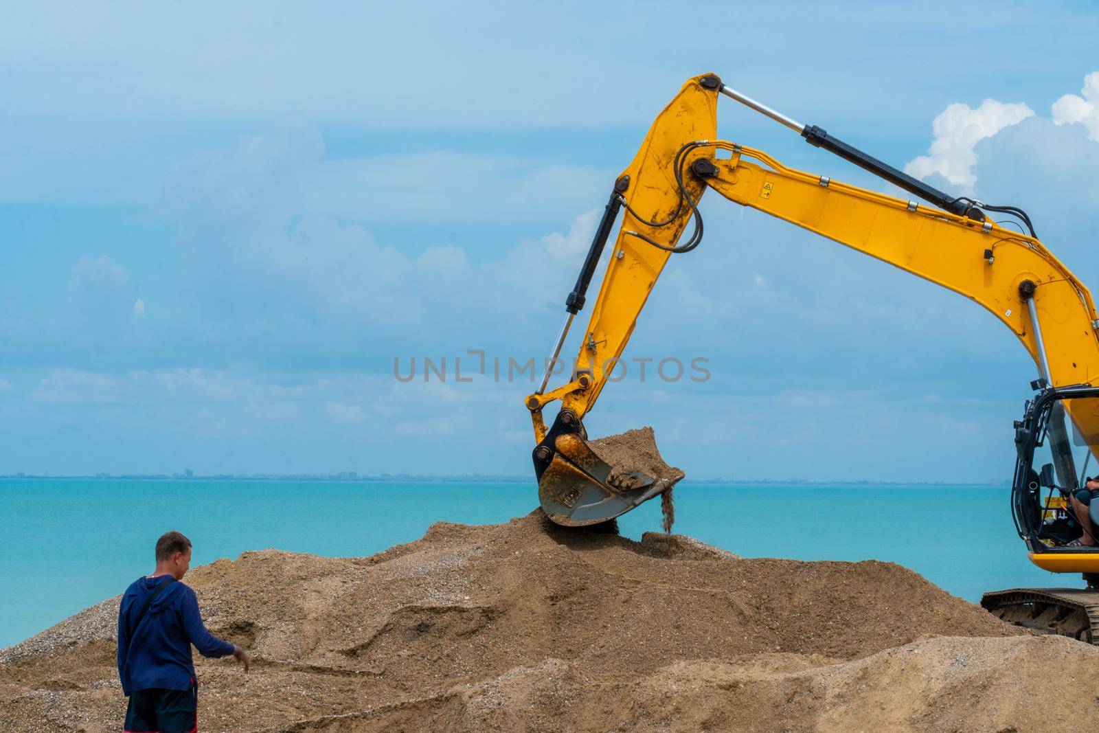 Sea excavator ground machine bucket heavy loader industry site digger, for construction building from sky from hydraulic activity, dirt engineering. Mover sun sunset, action