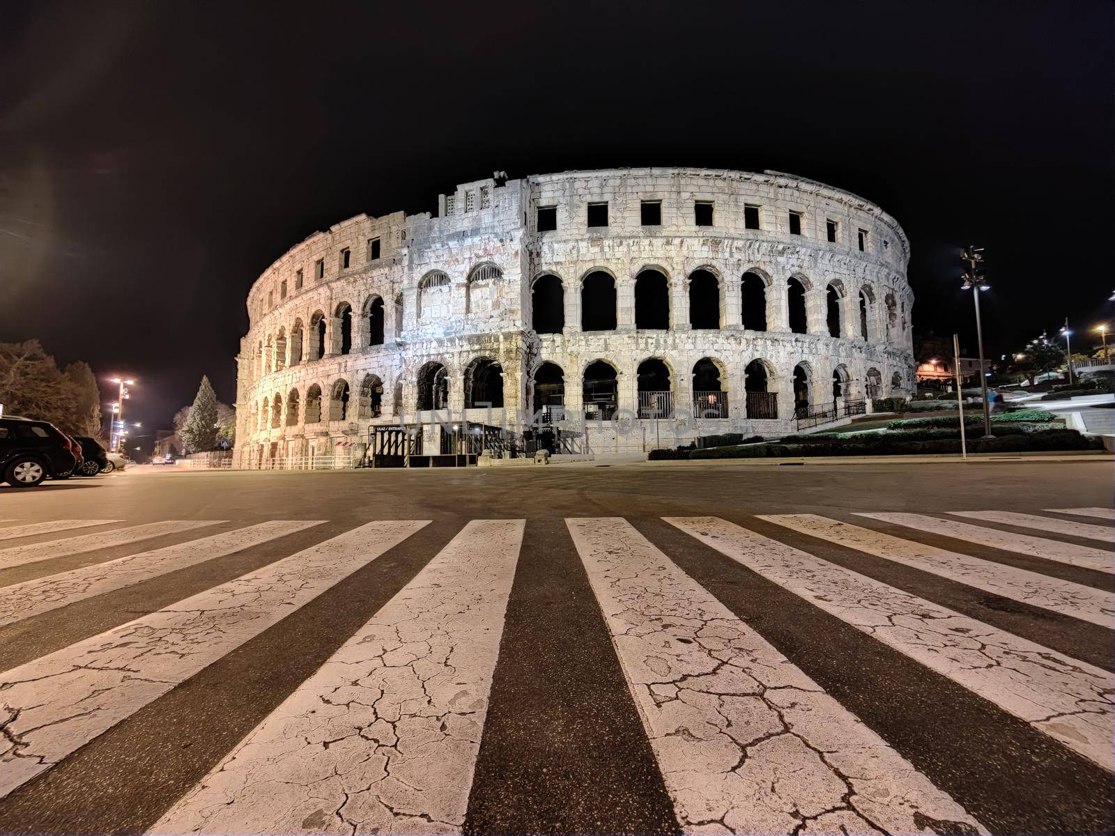 Croatia. Pula. Ruins of the best preserved Roman amphitheatre built in the first century AD during the reign of the Emperor Vespasian shot at night.