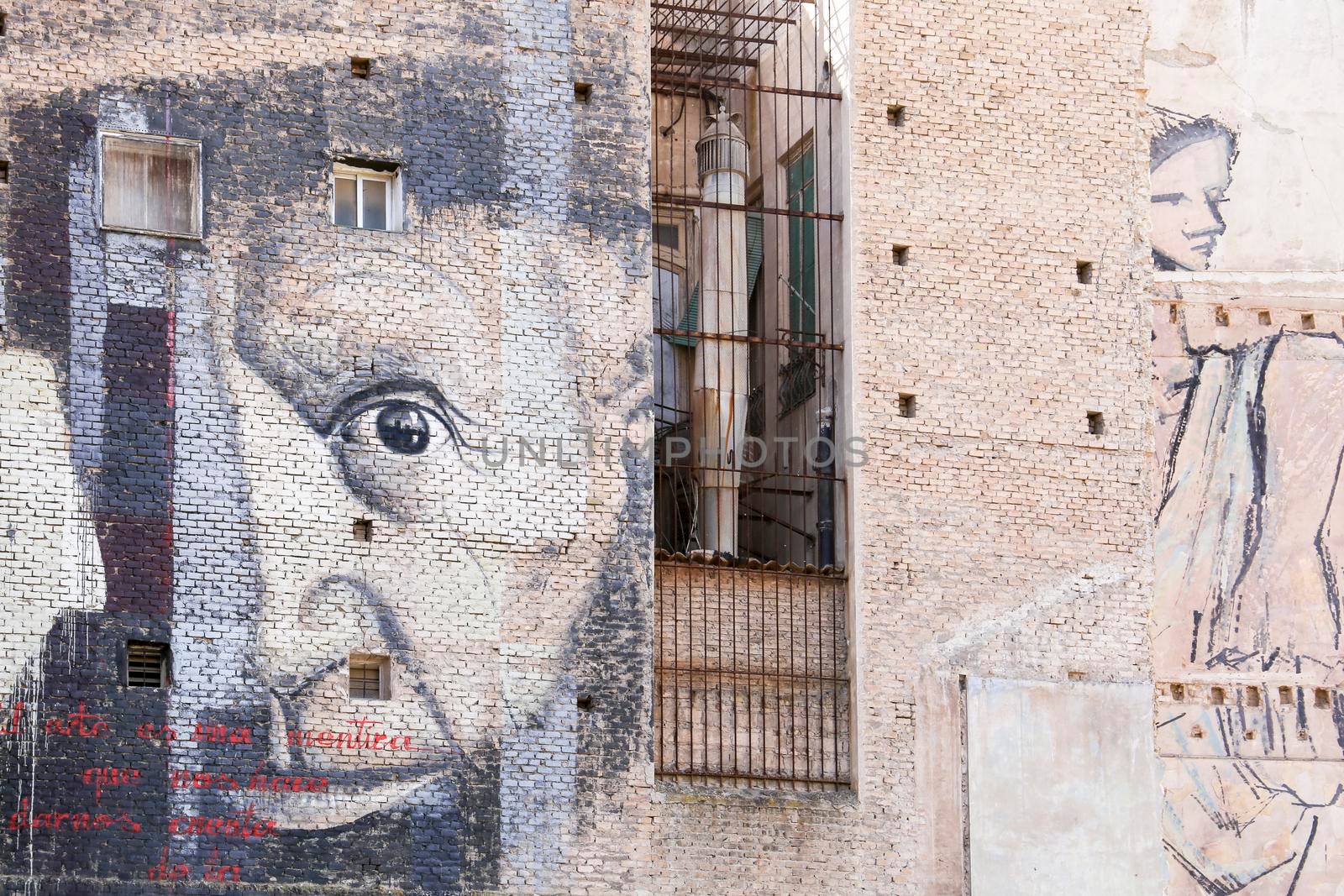 Paintings on the wall of old buildings in Cartagena by soniabonet