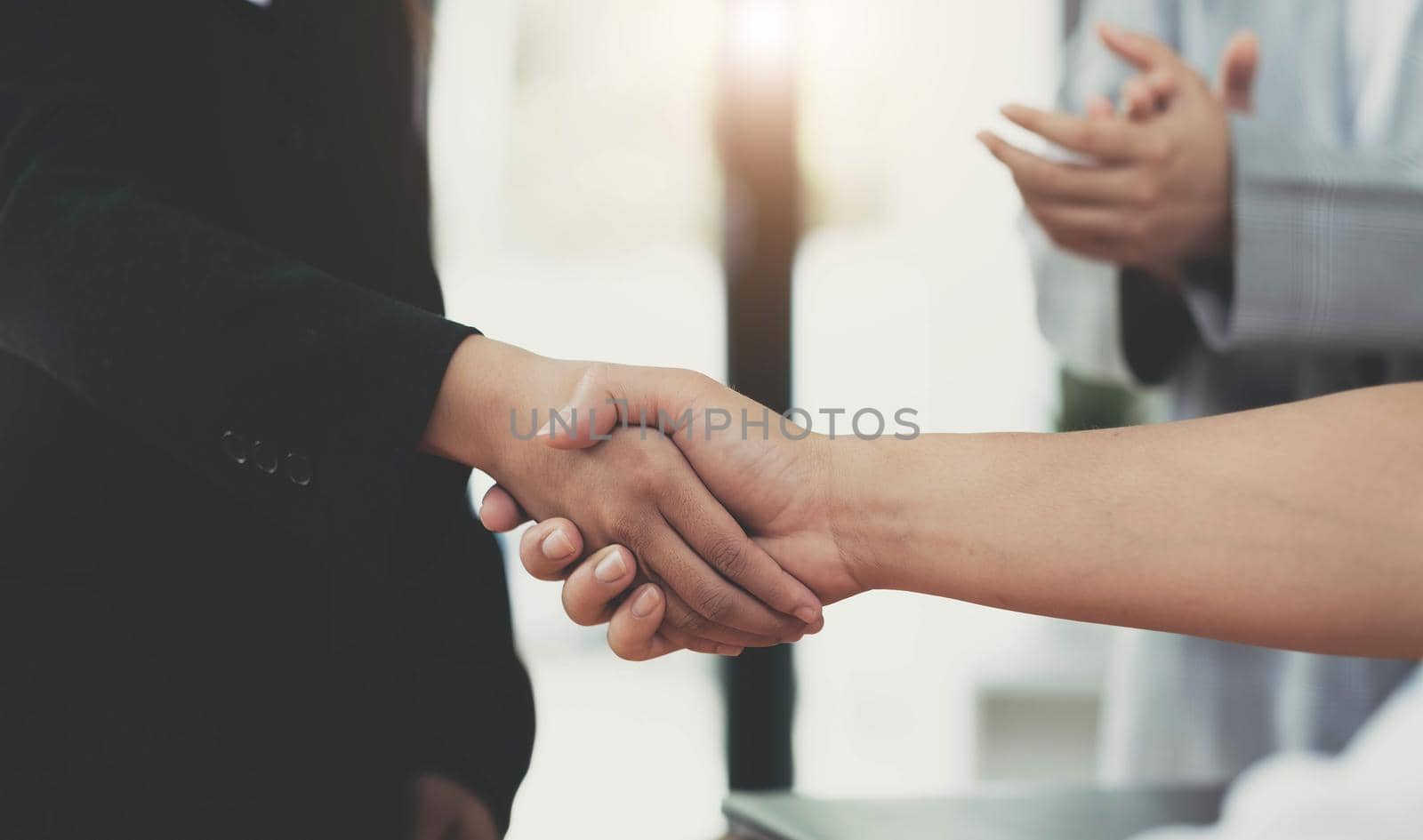 Image of Successful businessmen partnership handshaking after acquisition. Meeting for sign contracts and Group support concept..