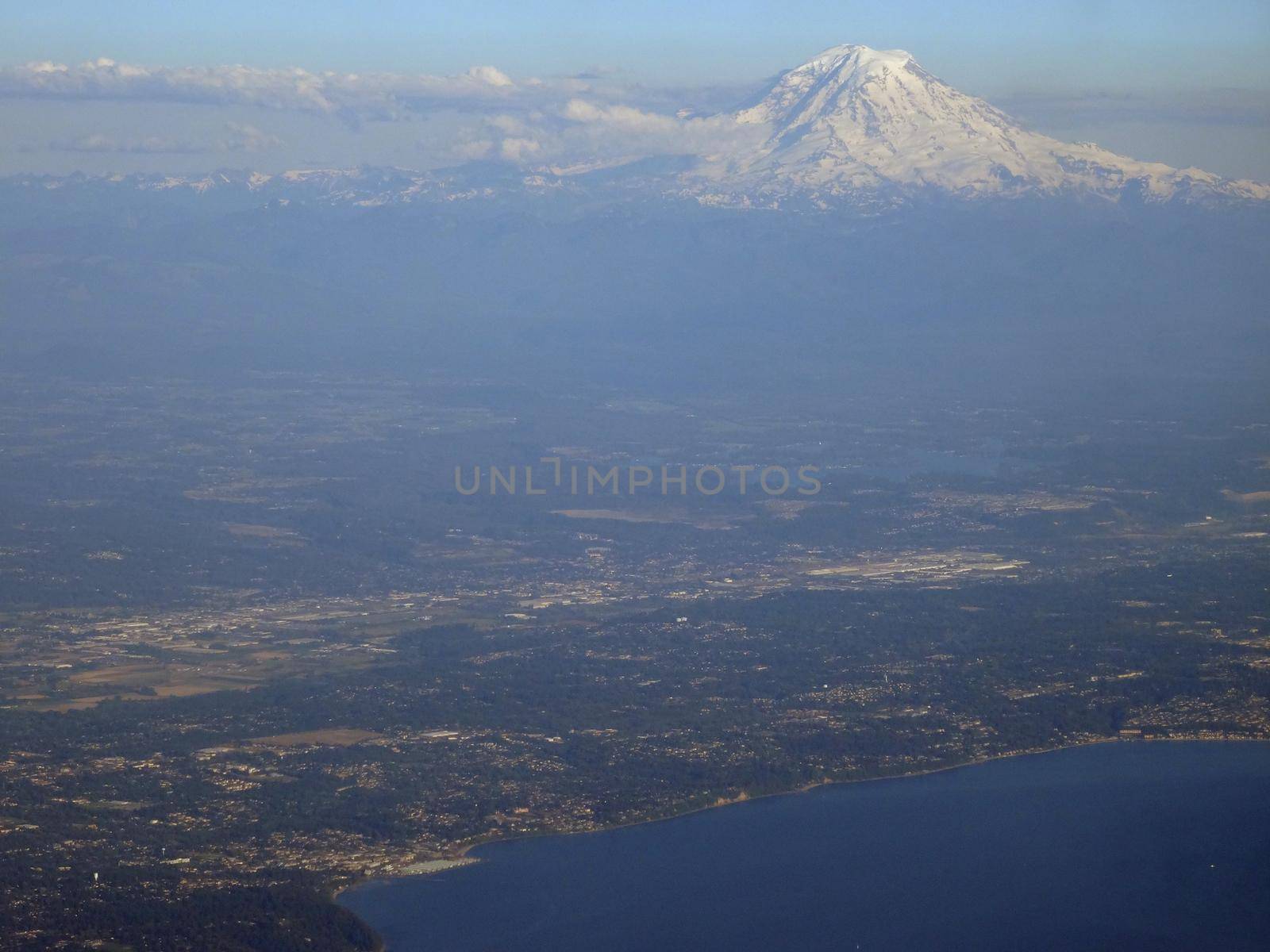 Aerial view Seattle with coast and Mount Rainier visible on June 26, 2016 in Seattle, WA.