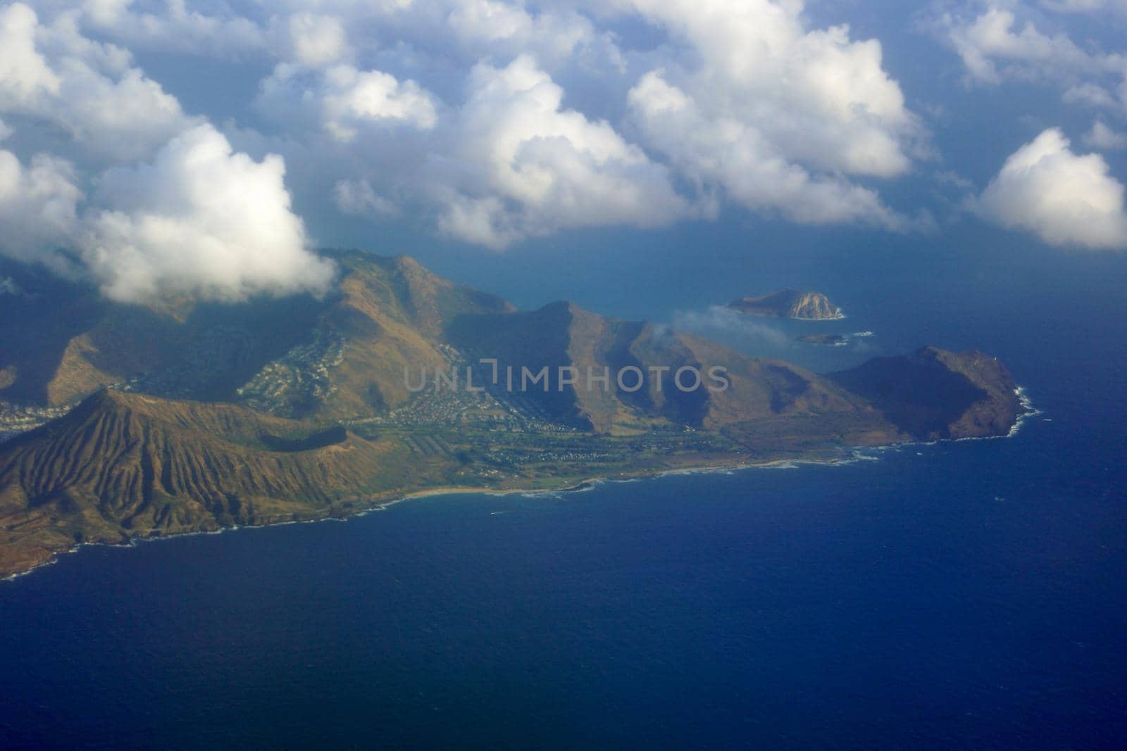 Aerial view of Sandy Beach, Rabbit and, Rock Islands, Makapuu Point, clouds and Pacific Ocean by EricGBVD