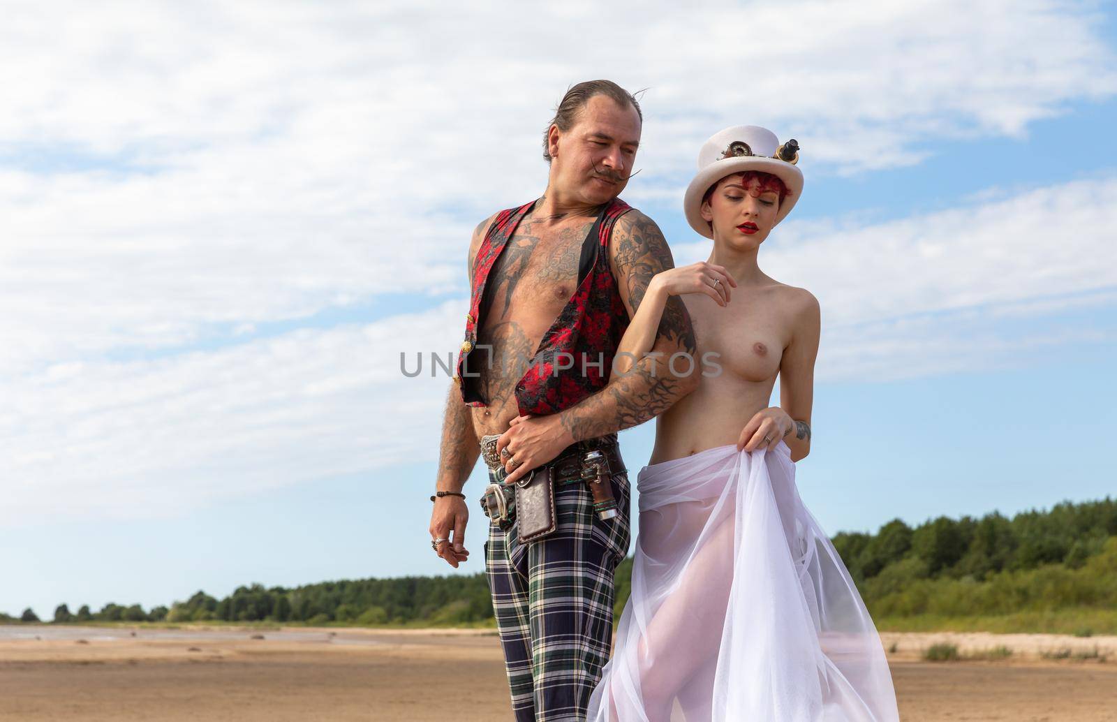 Wedding photo shoot on the shores of the Baltic Sea by palinchak