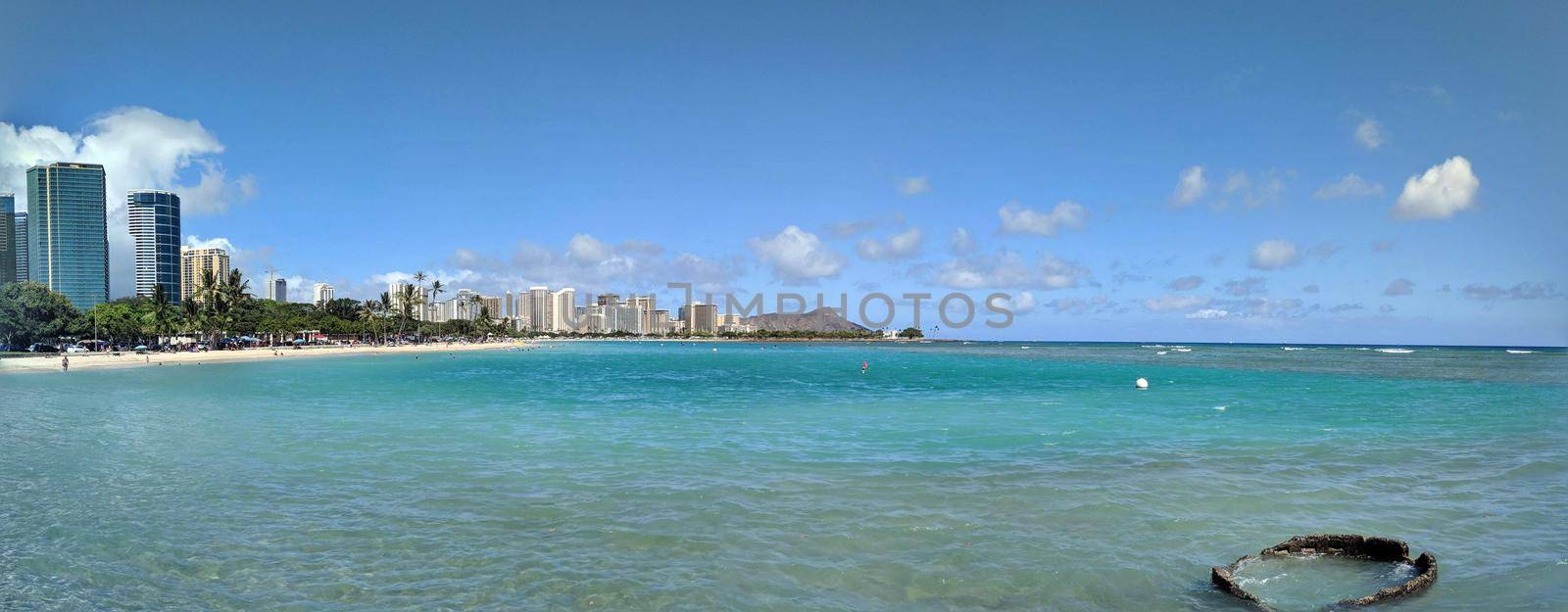 Ala Moana Beach Park with office building and condos in the background by EricGBVD