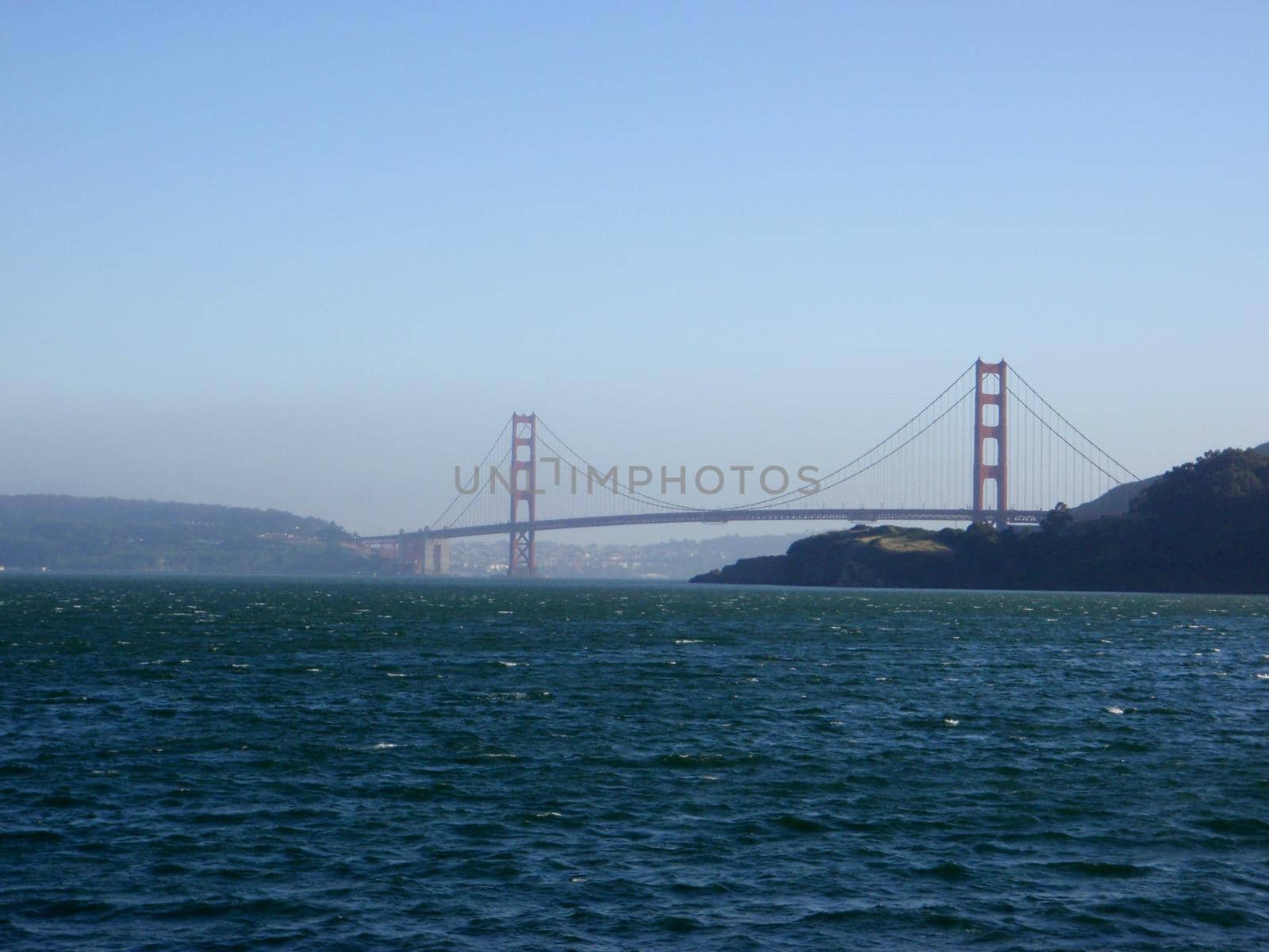 San Francisco Golden Gate Bridge seen from the water bridging San Francisco and Marin County in California.