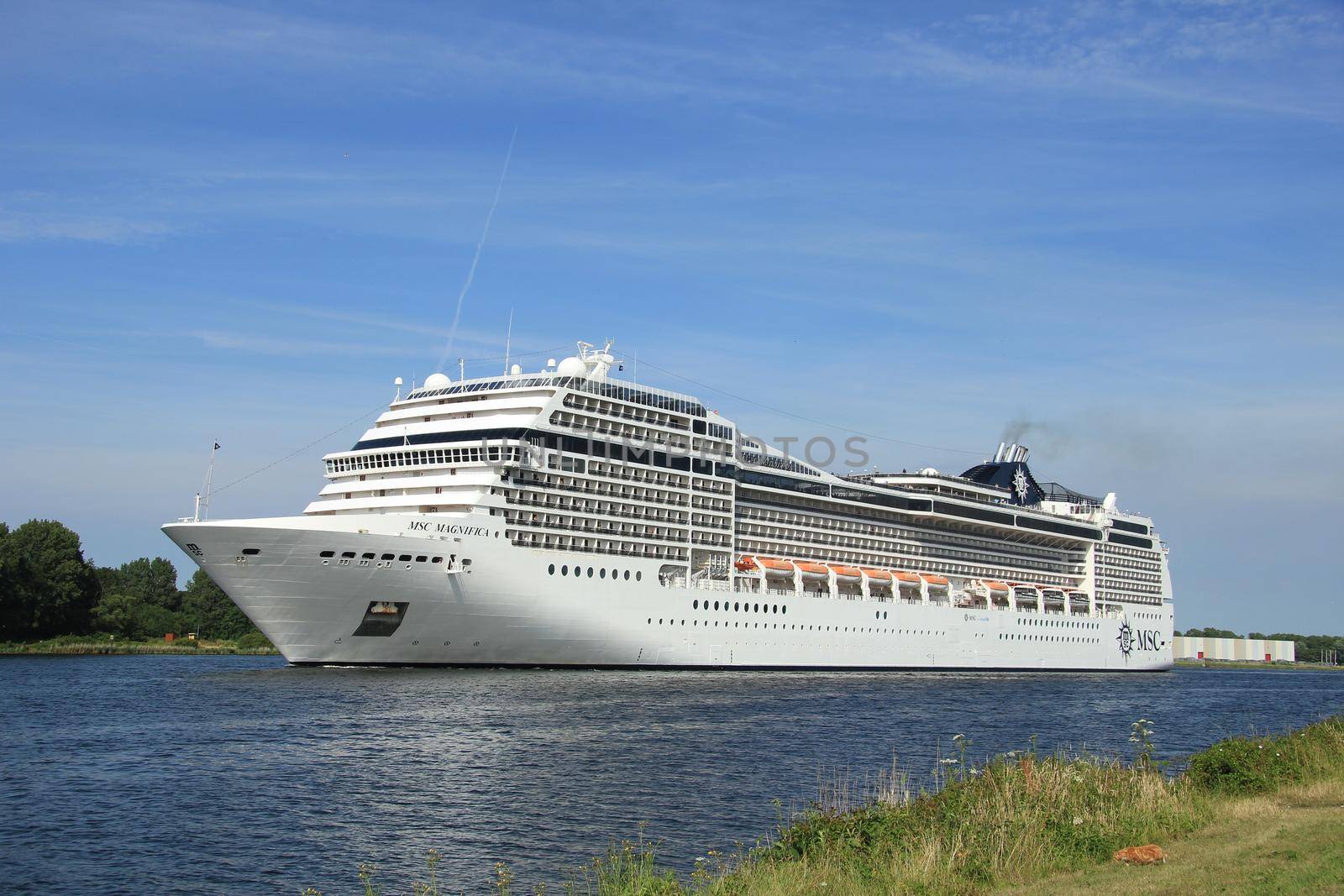 Velsen, the Netherlands, July 7th, 2014 : MSC Magnifica on North Sea Canal from Amsterdam towards the Ijmuiden locks, The Magnifica is operated by MSC since 2010 and  293.8 metres (964 ft) long.