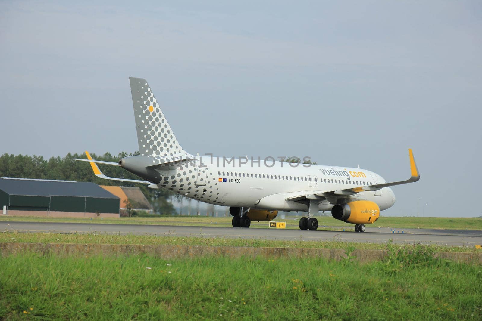 Amsterdam, the Netherlands -  - August, 10th 2015: EC-MBS Vueling Airbus A320-232 by studioportosabbia