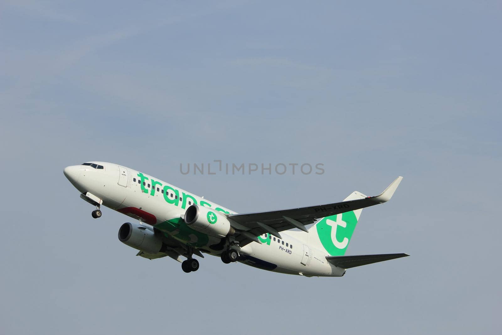 Amsterdam, the Netherlands  -  June 2nd, 2017: PH-XRD Transavia Boeing 737-700 taking off from Polderbaan Runway Amsterdam Airport Schiphol