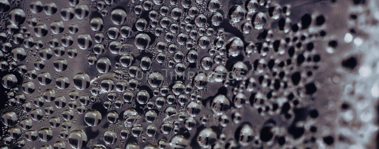 Many Water Rain Drops wet window condensation on glass. Fresh background. Textures formed by bubbles. Collection clear surface. Abstract real photo beautiful romantic cute wallpaper. Dark grey colour.