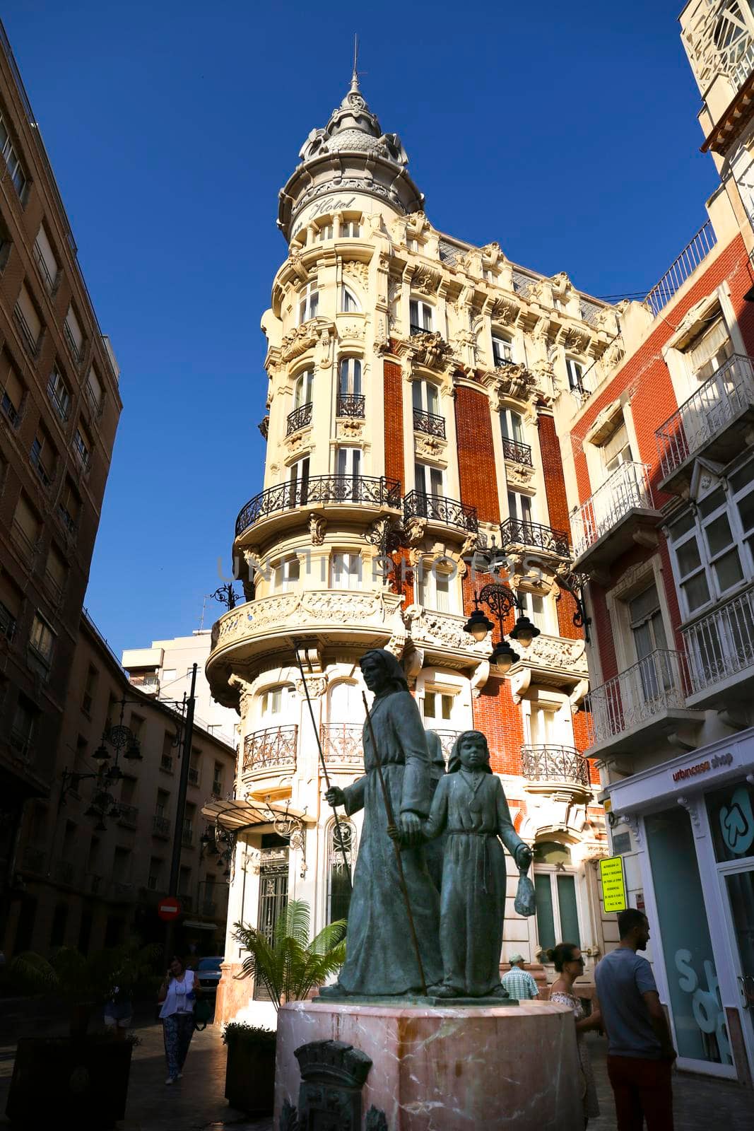 Cartagena, Murcia, Spain- July 18, 2022: Beautiful Modernist House called Gran Hotel and monument to the Processionist in Cartagena city